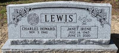 gray granite companion slant headstone with professional engineer and registered nurse emblems